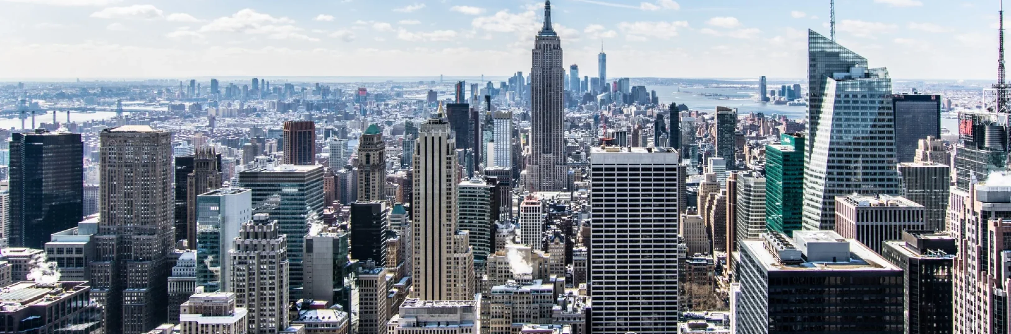 aerial-architecture-blue-sky-buildings-466685-scaled-1